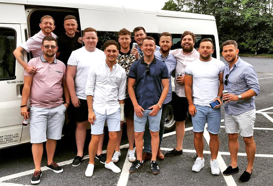 Young group of lads ready to enjoy their trip on a 16 seater with Blackpool Minibuses